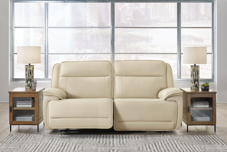 Double Deal almond leather 2-piece power reclining loveseat sectional front view