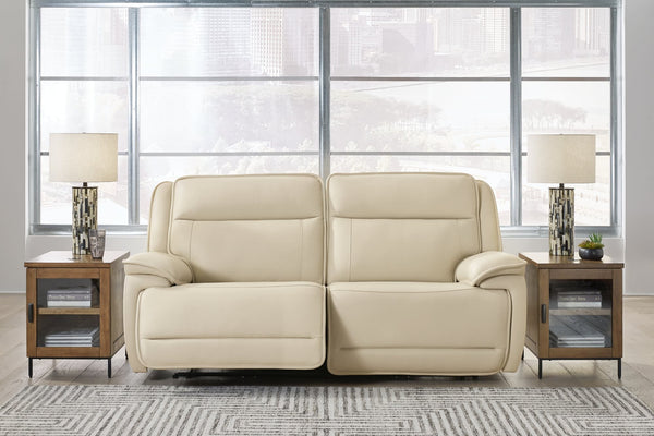 Double Deal almond leather 2-piece power reclining loveseat sectional front view
