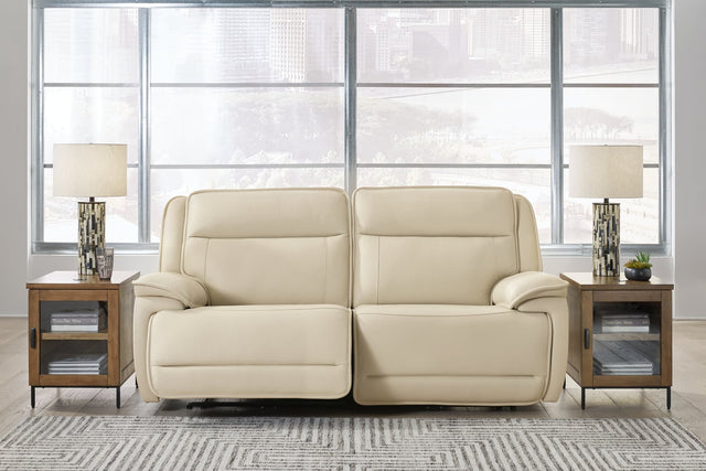 Double Deal almond leather 2-piece power reclining loveseat sectional front view