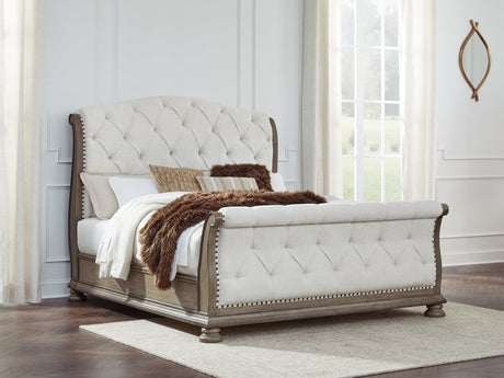 Ardenfield Light Brown King Upholstered Sleigh Bed front angle view