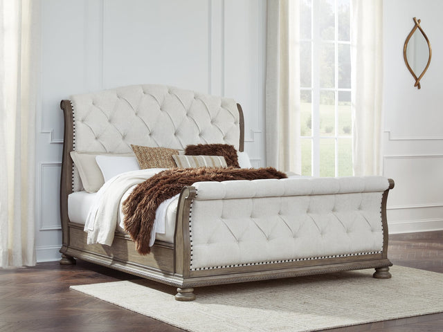 Ardenfield Light Brown King Upholstered Sleigh Bed front angle view
