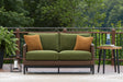 Horizon Hall brown and green outdoor loveseat front angle