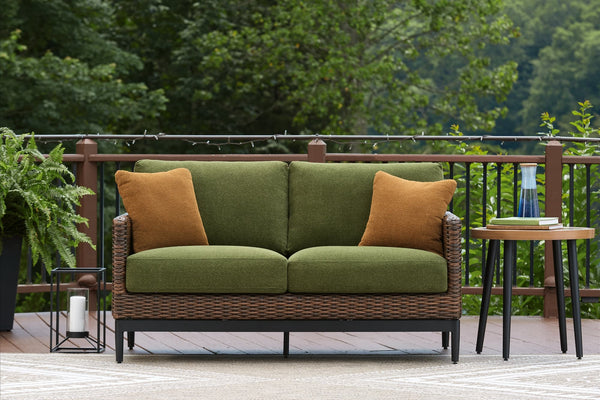 Horizon Hall brown and green outdoor loveseat front angle