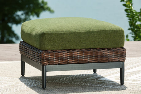 Horizon Hall outdoor ottoman front view with green cushion