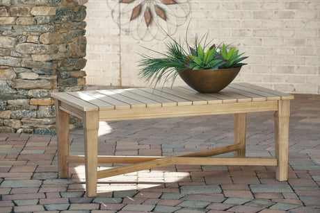 Carter Hall Outdoor Coffee Table in beige eucalyptus wood showing front angle