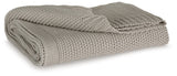 Gayelery Gray Cotton Throw Blanket draped on sofa arm