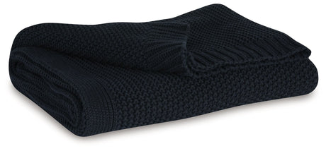 Gayelery black cotton throw folded on couch arm