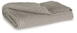 Gayelery Gray Cotton Throw Blanket draped over sofa arm