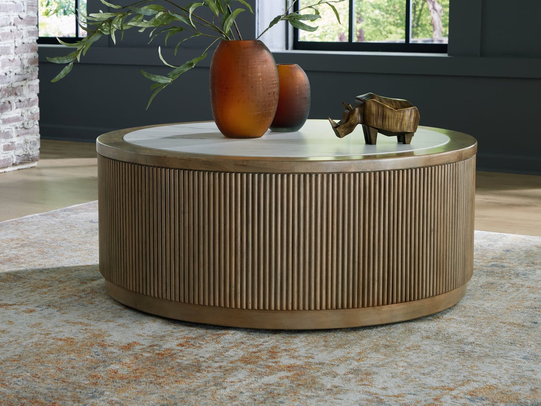 Camdill coffee table front angle showing round faux marble top
