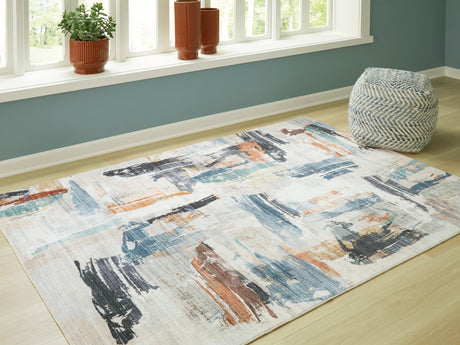 Hessland Multi 5 foot by 7 foot washable rug laid out flat