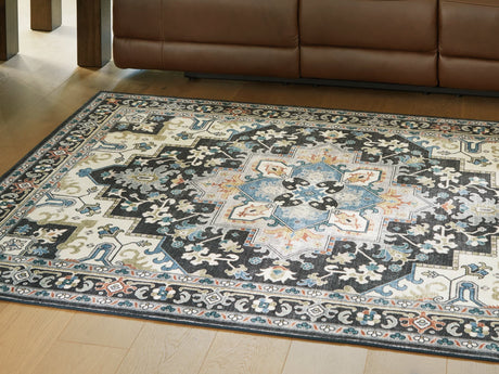 Leningston rug front view showing black cream blue medallion design