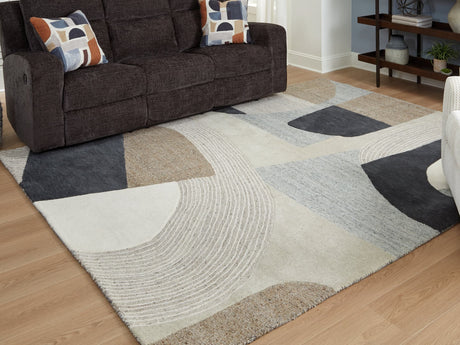 Edrickhill 8x10 rug in grayish teal, taupe, and cream angled view