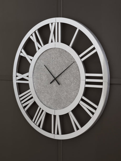Reinport mirror wall clock front view showing Roman numerals