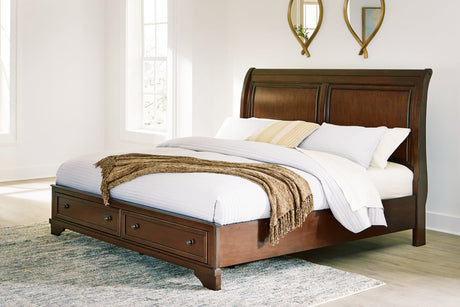 Trellington Brown Queen Sleigh Storage Bed front angle showing headboard and storage footboard