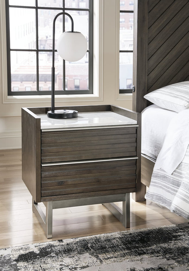 Arkenton grayish brown nightstand with white marble top, front view