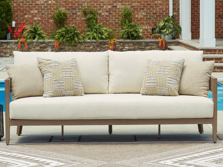 Serene Bay dark brown and white outdoor sofa with cushions front angle