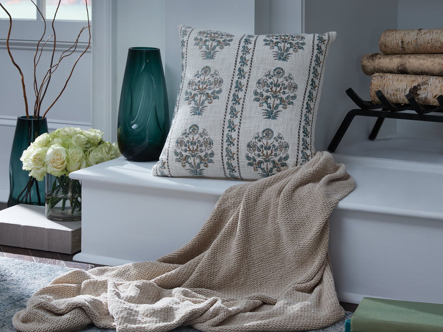 Paulmour floral accent pillow front view with ivory, green, and brown floral print