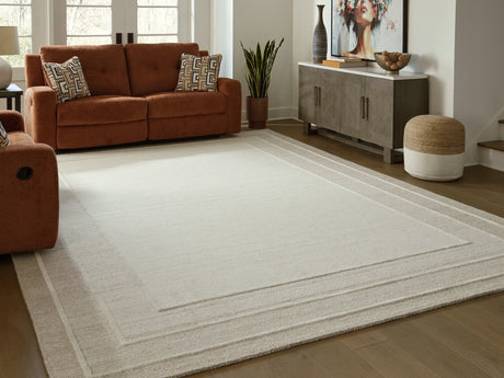 Teelgan Ivory and Tan Extra Large Rug with Bordered Design