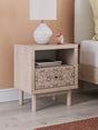 Arloster Tan Nightstand front angle showing floral drawer