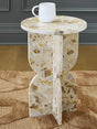 Treygan beige marble accent table side view