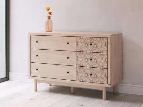 Arloster Tan Dresser front angle showing botanical drawer pattern