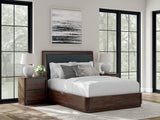 Dilenno Dark Brown Queen Upholstered Panel Bed front view