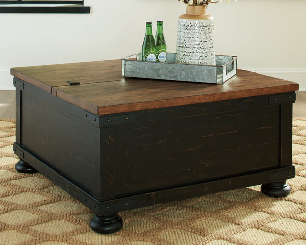 Valebeck black and brown coffee table front view with lift top open