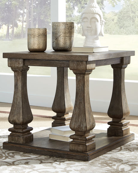 Johnelle Gray Coffee Table with distressed weathered gray finish, front angle view