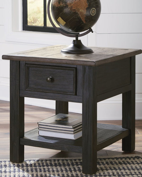 Tyler Creek rectangular end table with weathered grayish brown top and black textured finish, front view