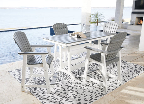 Transville gray and white outdoor counter height dining table with four barstools viewed from front angle