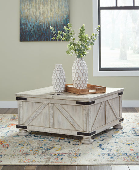 Carynhurst whitewash coffee table with dual-lid tabletop and hidden storage