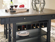 Tyler Creek black finish counter height dining table with wine bottle storage under tabletop