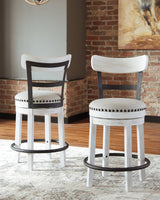 Valebeck White and Brown Counter Height Dining Table with 2 Barstools - front view