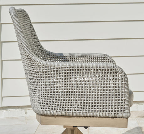 Seton White Creek outdoor dining table and 4 white wicker chairs front view