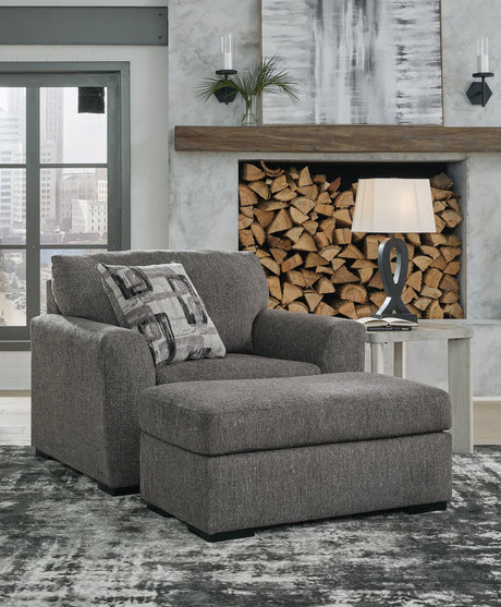 Gardiner pewter chair and ottoman front angle