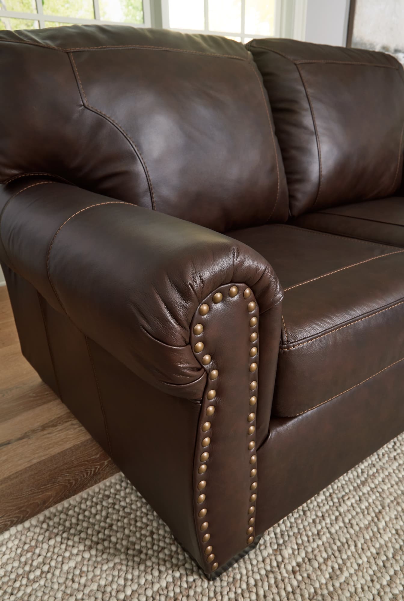 Colleton dark brown sofa and loveseat main view