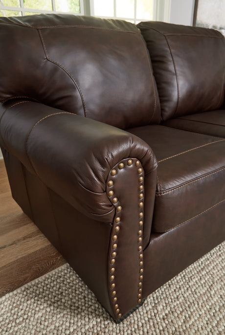 Colleton dark brown sofa and loveseat main view