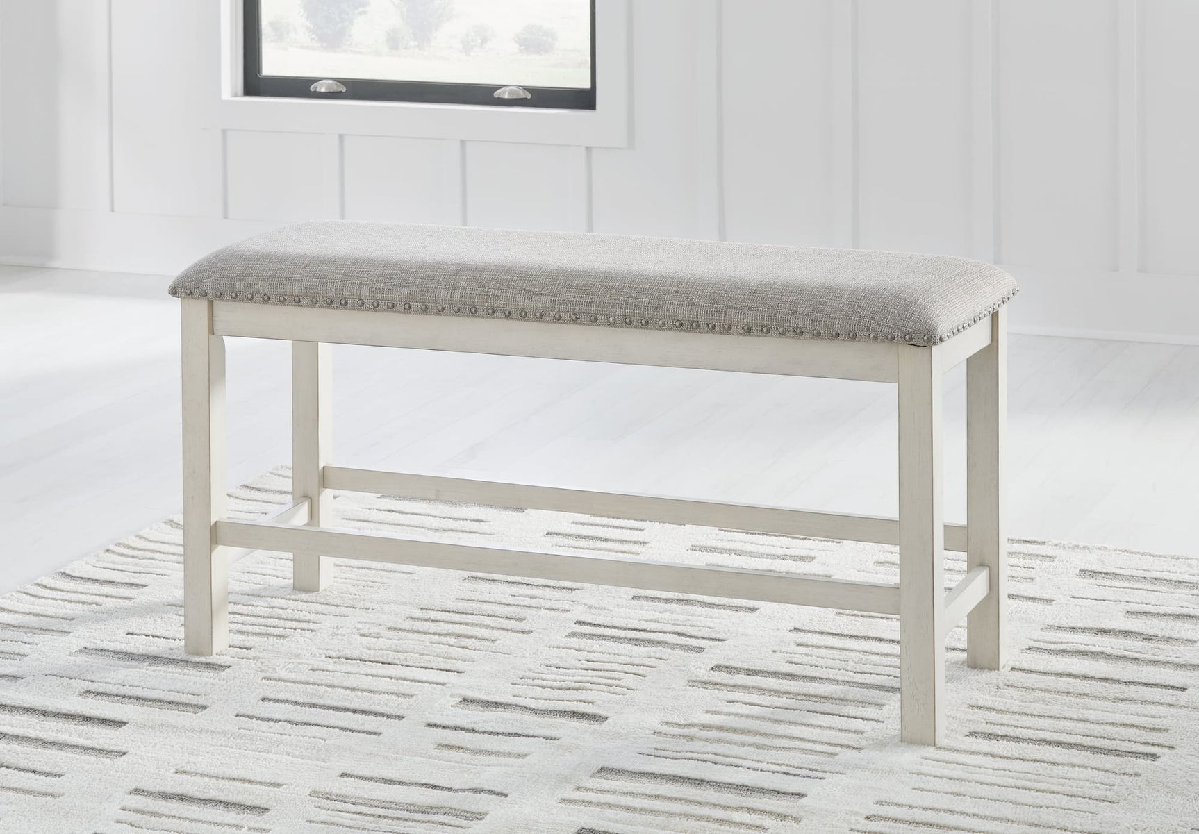 Robbinsdale antique white counter height dining table with 4 matching barstools and bench front view