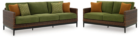 Horizon outdoor sofa front view with green cushions