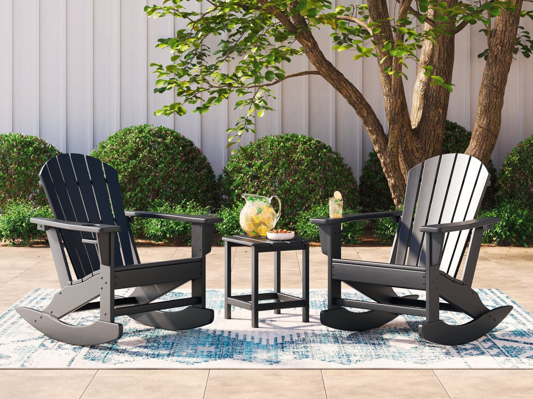 Front view of Sundown Black Treasure outdoor set with 2 rocking chairs and end table