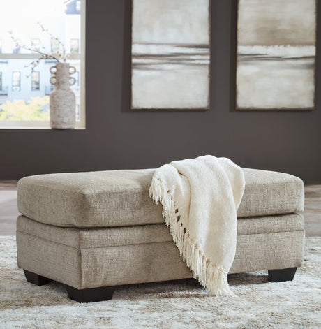 Stonemeade Taupe Chenille Upholstered Ottoman front view