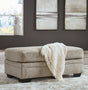 Stonemeade Taupe Chenille Upholstered Ottoman front view