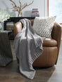 Anawood Gray Chenille Throw draped over sofa arm