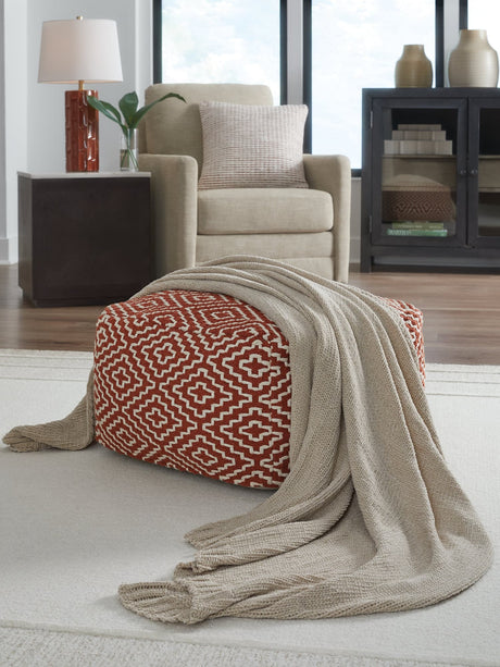 Anawood oatmeal chenille throw blanket displayed on sofa