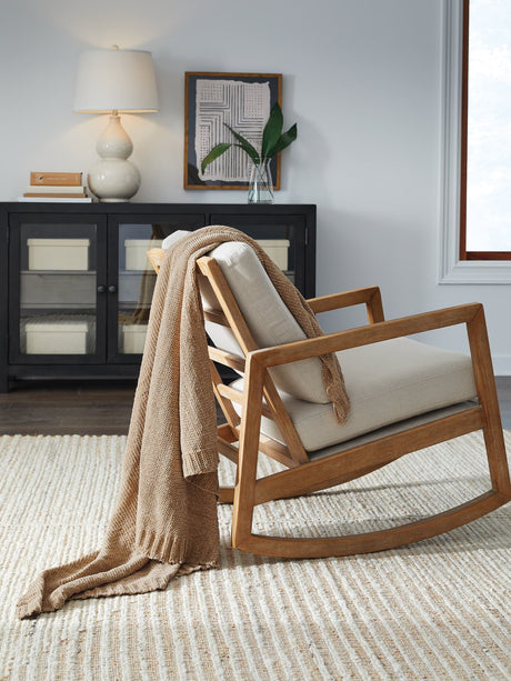 Anawood gold chenille throw draped over sofa