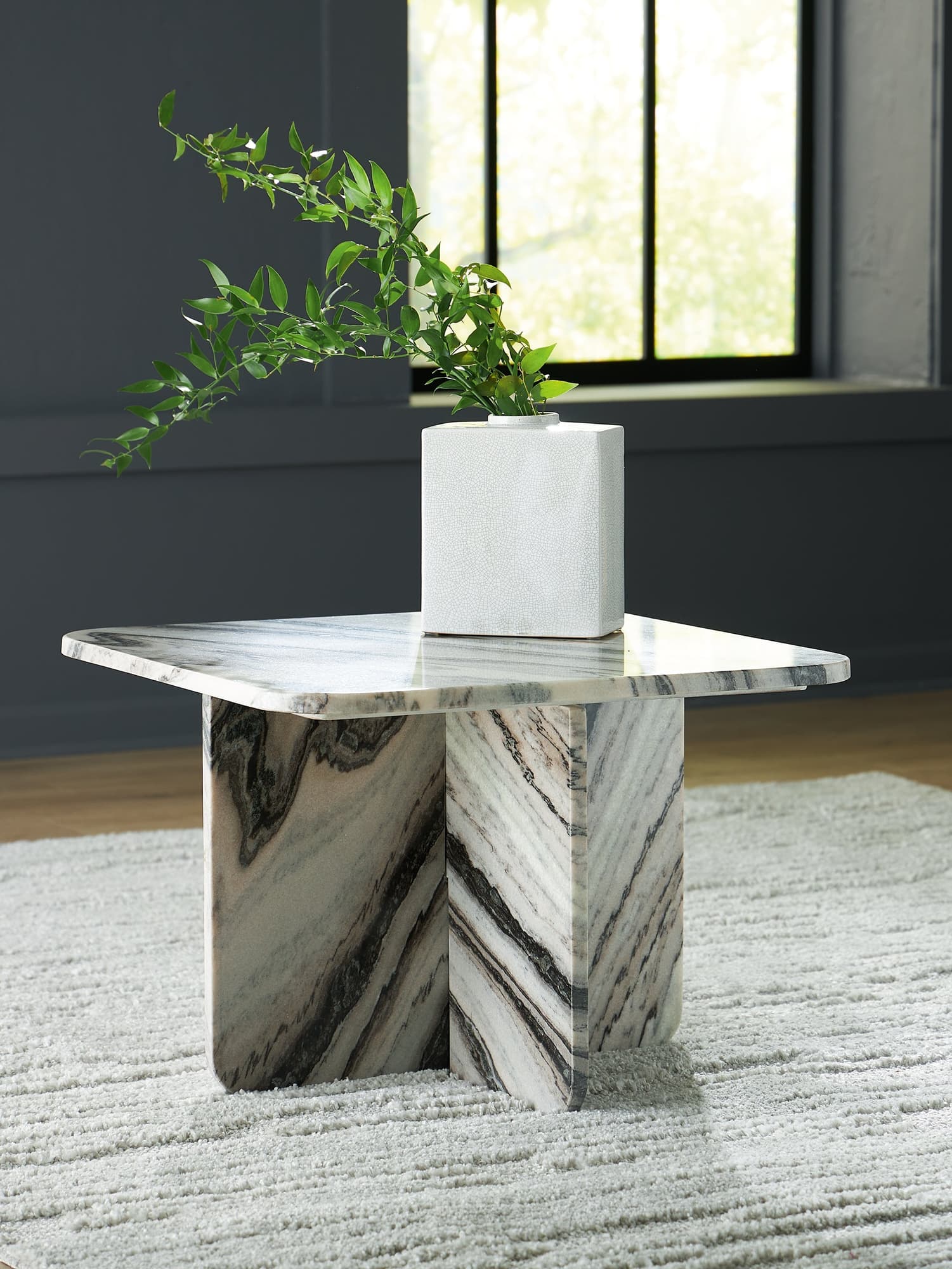 Baretton square marble accent coffee table with black, white, and taupe tones, angle view
