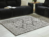 Glennisman black gray ivory large botanical pattern rug front view