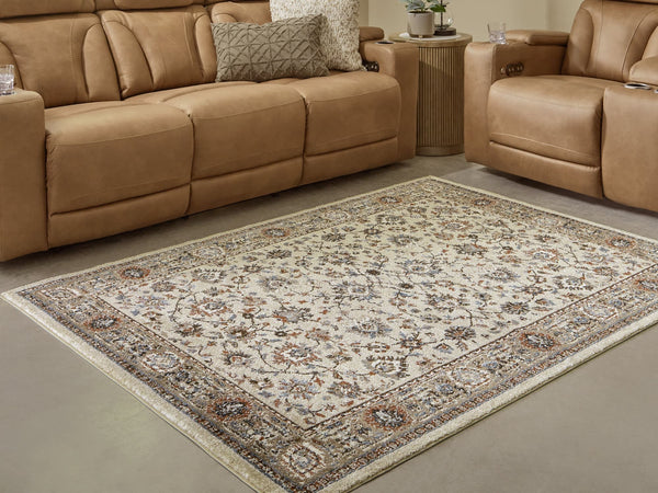 Beritham Medium Blue, Brown and Beige Floral Area Rug flat lay