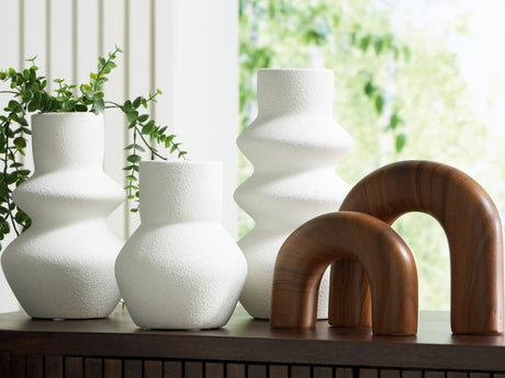 Carterworth accessory set with 3 textured white ceramic vases and 2 brown faux wood sculptures, frontal view