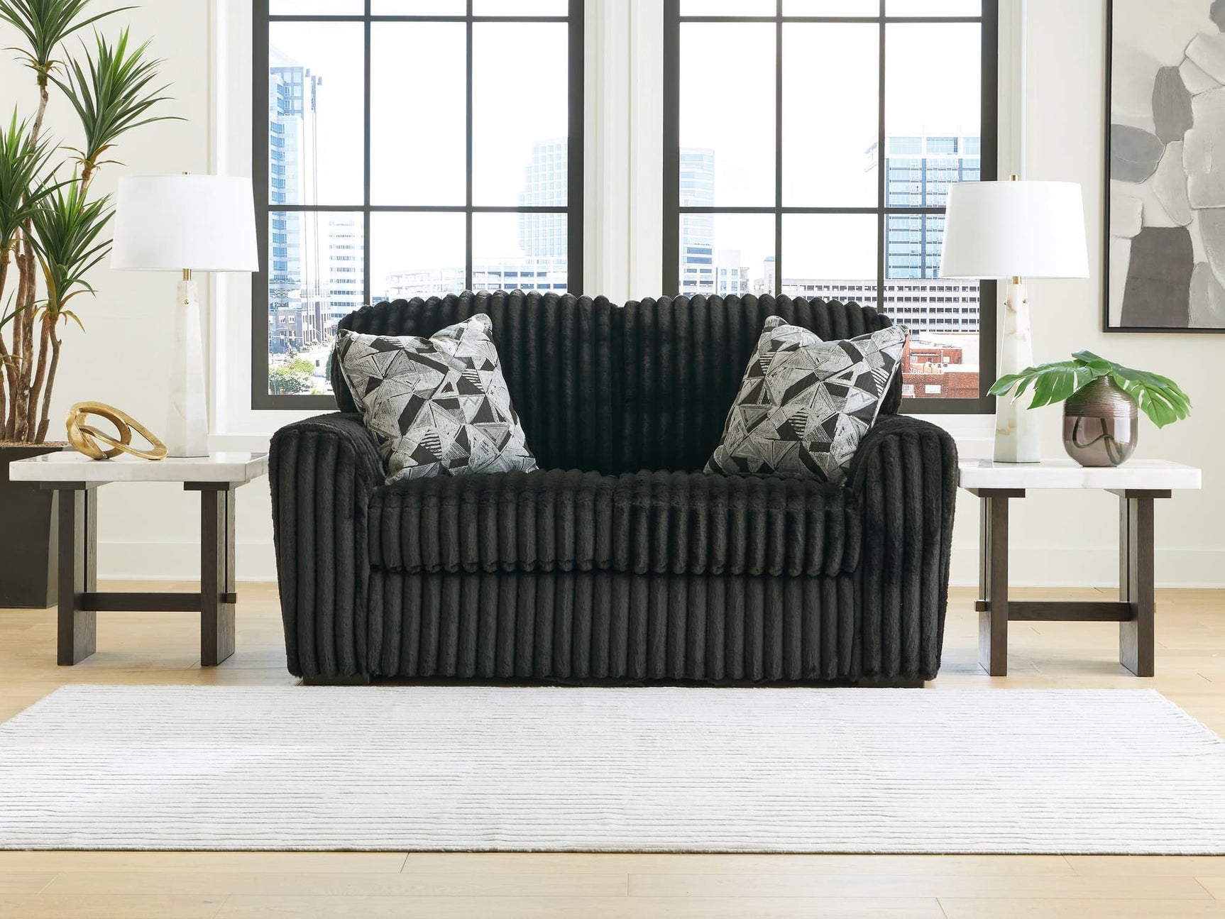 Midnight-Madness Onyx velvet loveseat angled side view